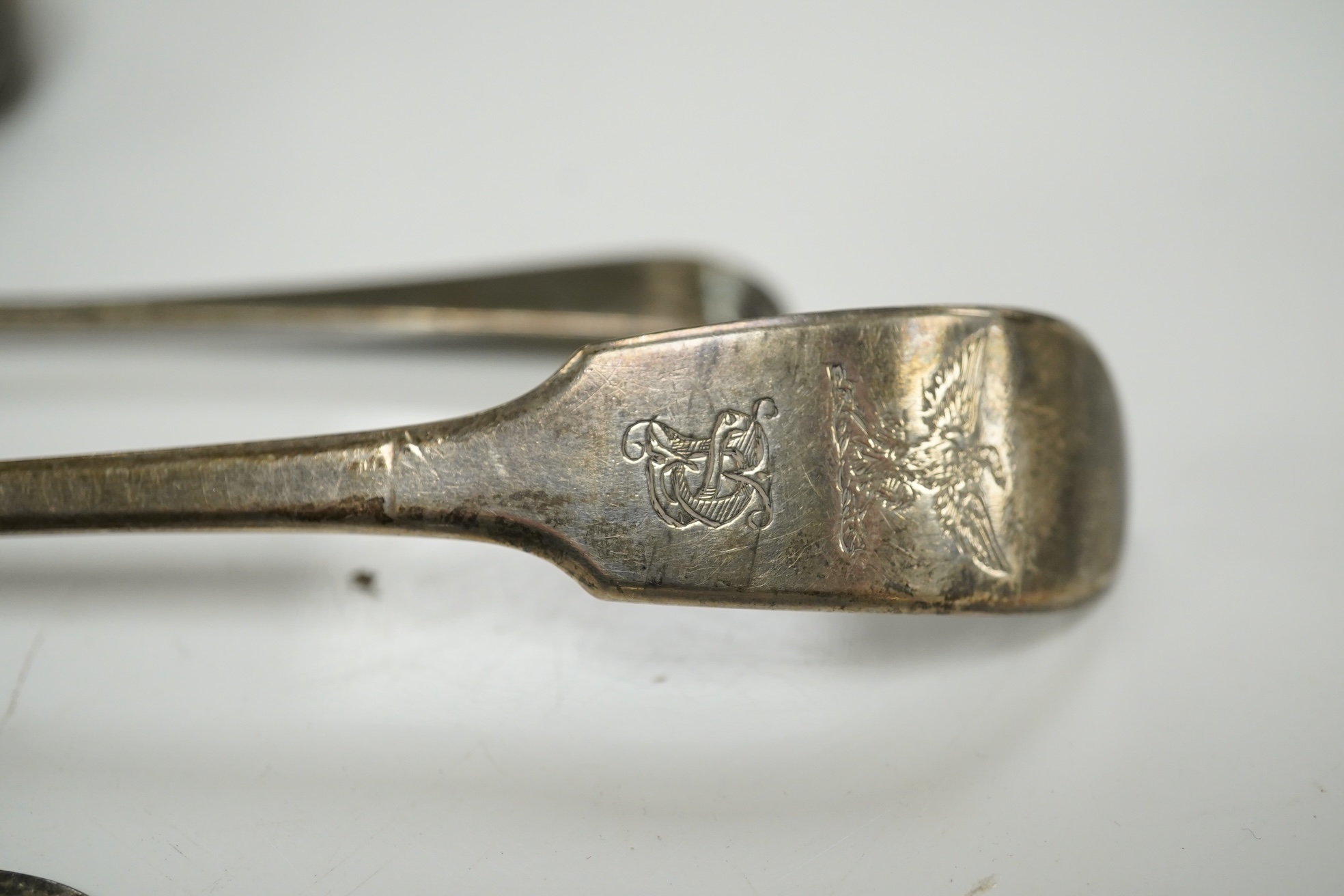 A set of three Victorian silver tablespoons, by Elizabeth Eaton, London, 1854, one other Victorian silver tablespoon, a pair of George III sauce ladles, London, 1790 and sundry silver flatware, including an 18th century